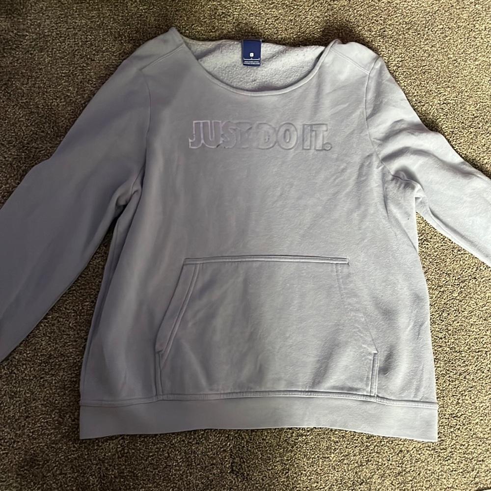 Nike Sweatshirt, size Large. Color is like a light blue. Has never been worn